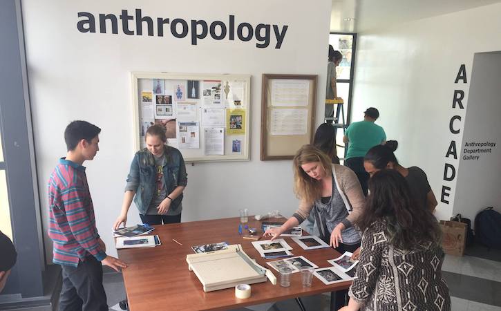 students in anthropology looking through materials